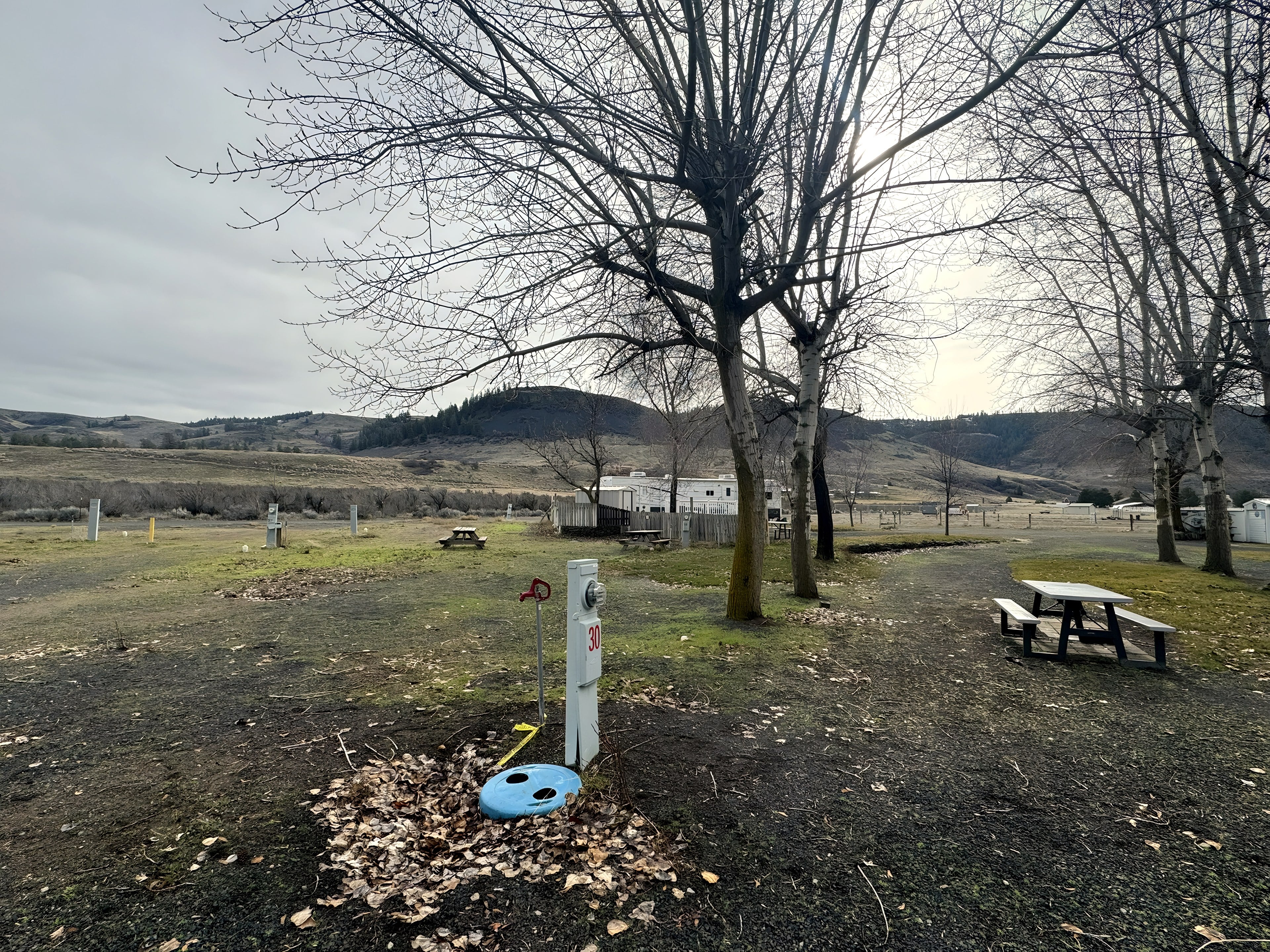 Hookup pedestal and picnic table on an open site