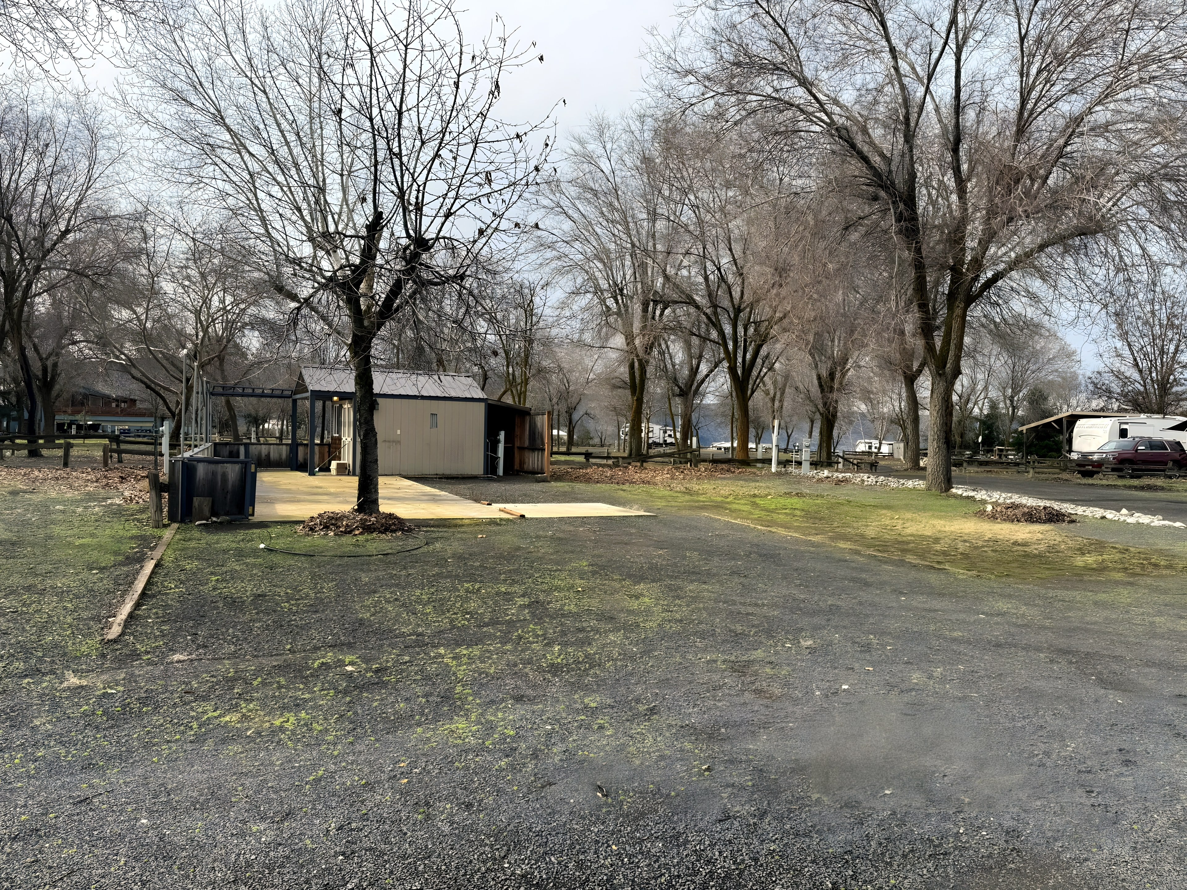 Gravel loop beside a small park building